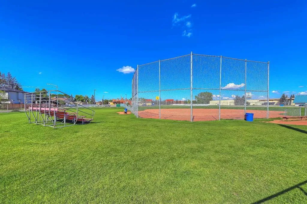 Baseball diamond and backstop with bleachers near Renfrew