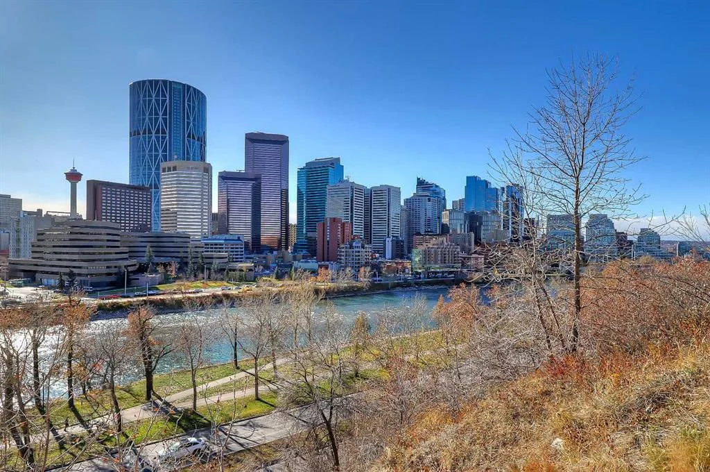 Bow River pathway with the downtown Calgary skyline in autumn