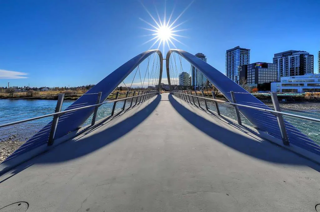 Pedestrian bridge over the Bow River leading toward Bridgeland