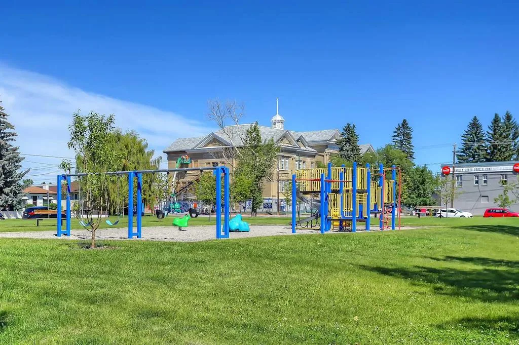 Neighborhood playground with the historic Colonel Walker School building behind it